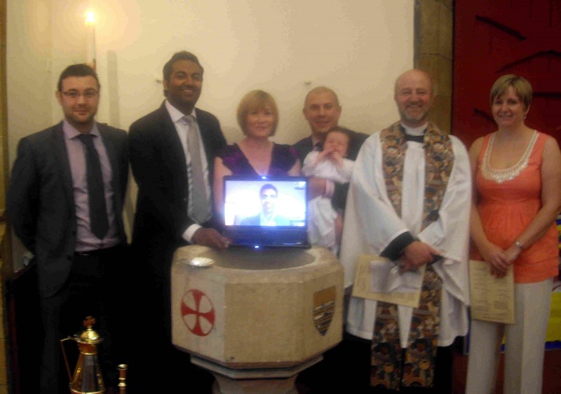 Godparent in Hong Kong joins in live via Skype